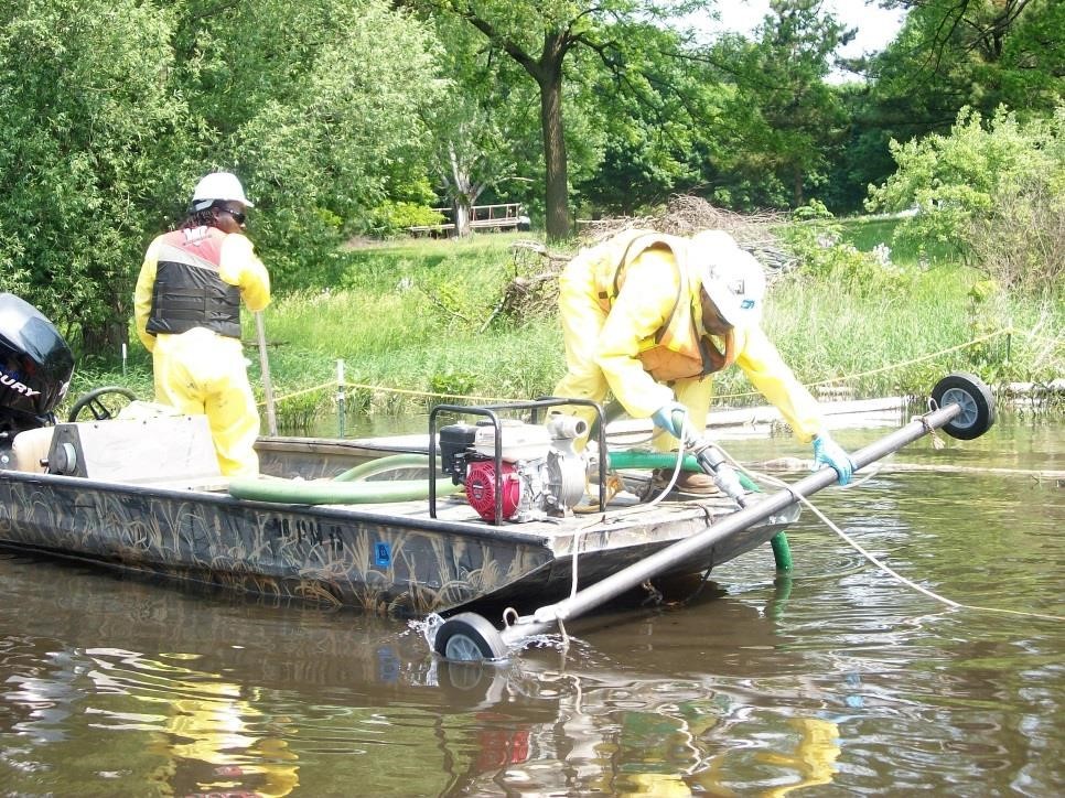 team on a jon boat deploys a rotating stinger